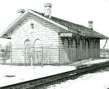 Corner view of the Former Grand Trunk Railway Station, showing both the back and side façades, 1992.; M. Carter, 1992.