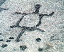Detail view of the petroglyphs at Peterborough Petroglyphs National Historic Site of Canada, 1993.; Parks Canada Agency / Agence Parcs Canada, B. Morin, 1993.