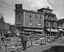 This historic photograph presents the excavation of Main Street to build the new Subway Structure.; Moncton Museum