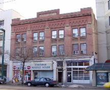 View of the principal front facade of the Jasper Block looking north from Jasper Avenue; City of Edmonton, Planning and Development Department, March 2003