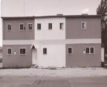 Exterior view of the International Pulp and Paper Company House circa 2000, before restoration work started.; HFNL 2006