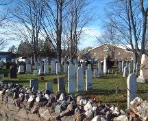 North-west view including part of rubble wall, Old Burying Ground, Wolfville, NS, 2005.; Heritage Division, NS Dept. of Tourism, Culture and Heritage, 2005.