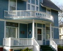 A detailed view of the front veranda and balcony of the J. Murray Lawson House, Yarmouth, NS 2006.; Heritage Division, NS Dept. of Tourism, Culture & Heritage, 2006