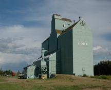 Alberta Wheat Pool Grain Elevator Site Complex Provincial Historic Resource, Andrew - elevator flanked by two annexes and adjacent manager's office (September 2005); Alberta Culture and Community Spirit, Historic Resources Management Branch, 2005
