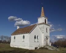View of the south west facade showing the original 1910 structure with the steeple which was added in 1918 (September 2003); Alberta Culture and Community Spirit, Historic Resources Management Branch, 2003