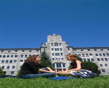 The main body of the Simon-Larouche Pavilion capped with a central tower with a crucifix.; Michel Carrier, maître-photographe