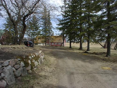 View of driveway and barn