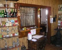 Interior image of McCord Museum featuring the former ticket window, 2005.; Clint Robertson, 2005.