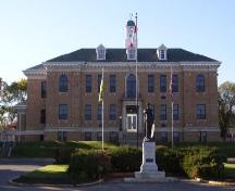 Front elevation of the Court House featuring the landscaped grounds, 2003.; Government of Saskatchewan, Jennifer Bisson, 2003.