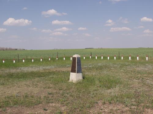 View of cairn showing two of the plaques: District