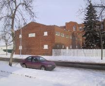 View of the 1946 gymnasium addition from the southwest along 68 Street (March 2006); City of Edmonton, 2006