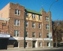 Street façade of Kenora Apartments showing imitation Medieval thatching on upper level, 2005.; Ross Herrington, 2005.