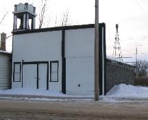 View of front facade highlighting the bell tower, 2004.; Government of Saskatchewan, James Winkel, 2004.