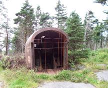 Remnants of shield and 6-inch Seacoast Gun M1903A2 with Barbette Carriage M1, located near the bunker. Photo taken 2005.; HFNL/ 2006