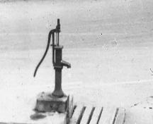 Black and white image of the pump without the trough; Elizabeth Toy