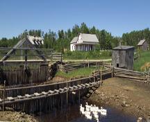 Vue général sur le haut du Village Historique Acadien à partir du pont; Village Historique Acadien