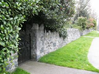 Rock retaining wall at the front of the property.