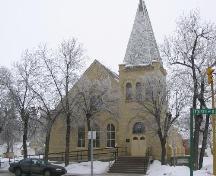 View of  St. Paul's Lutheran Church featuring the corner tower and rounded-arch windows, 2004.; Government of Saskatchewan, B. Flaman, 2004
