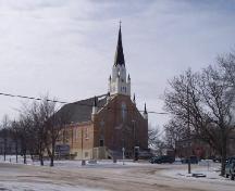 Front and side facades of St. Radagonde Roman Catholic Church featruing the tower with pinacles, 2006; Mike Fedyk, 2006.