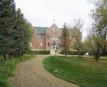 View of front elevation, showing landscaped courtyard in foreground, 2004.; Government of Saskatchewan, Jennifer Bisson, 2004.