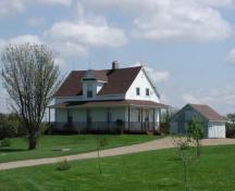 Birthplace of Roméo LeBlanc - This photo shows the veranda on the west and south sides of the house, as well as the gable dormer on the front façade.; Gérard LeBlanc
