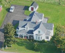 Aerial view of the Sylvain Gaudet House which reveals the rather irregular architectural style of the structure; Memramcook Valley Historical Society