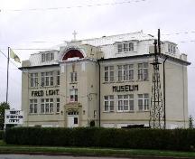 Front elevation, prominent entryway and mansard roof.; Government of Saskatchewan, J. Bisson, 2003
