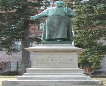 The Lefebvre Statue on its pedestal; The Memramcook Valley Historical Society
