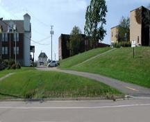 Butte à Pétard as seen from Centrale Street with the Municipal Building to the far left and the former Little Sisters Convent to the right, where the Saint-Thomas seminary was located in 1854.; Gérard LeBlanc