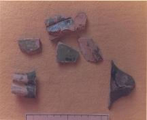 Ceramics from Fort Toulouse, Nova Scotia, Centimetre scale.; Parks Canada, 1985