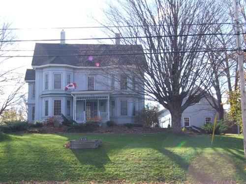 Front elevation and barn