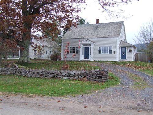 Front elevation and outbuilding