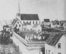 Church Street looking westward circa 1900. Frazer Park presently comprises most of the cemetery pictured on the left. ; From "Unto the Sea: A History of Grand Bank" by Garfield Fizzard. Grand Bank Heritage Society (publisher), 1987.
