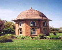 View of the peacock house from the east showing two-storey elevation – June 2003; OHT, 2003