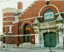 An octagonal, castellated turret and impressive stone entrance highlight the north facade.; City of Windsor, Planning Department