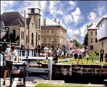 Contextual view of the building in Merrickville showing close location to Rideau Canal – c. 2000; realmerrickville.ca, 2005