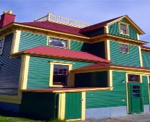 View of rear facade showing mulit-gabled roof structures.  ; HFNL 2007