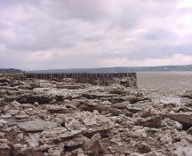 View of the wharf - photo taken from the east bank of the Petitcodiac River; Memramcook Valley Historical Society Inc.
