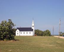 Contextual view, from the south, of Toutes Aides Roman Catholic Church, Toutes Aides, 2006; Historic Resources Branch, Manitoba Culture, Heritage and Tourism, 2006