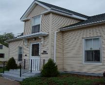 Detail of dormer over entry, 19 Water Street, Bridgetown, NS, 2007.; Heritage Division, NS Dept. of Tourism, Culture and Heritage, 2007.