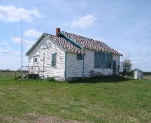 View of the Timberland School's front entrance and east window wall, 2007.; Government of Saskatchewan, Brett Quiring, 2007