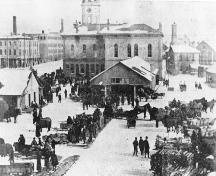 View of east side of market pavillion and town hall showing 1875 addition on back -1896; Guelph Public Library