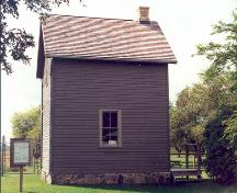 View of the north elevation showing central window and fieldstone foundation – c. 1995; St. Clair Parkway Commission, 1995