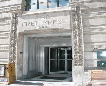 Main door detail of the Free Press Building, Winnipeg, 2006; Historic Resources Branch, Manitoba Culture, Heritage and Tourism 2006