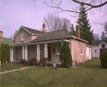 Corner view of the McCrae House National Historic Site of Canada, showing the front elevation, 1990.; Parks Canada Agency/ Agence Parcs Canada, 1990.