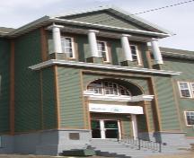 Detailed view of the tower located on the main facade, Star of the Sea Hall.  Photo taken summer 2004.; HFNL 2004