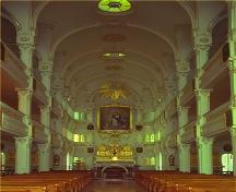 Vue centrale de l'intérieur de la chapelle du Bon-Pasteur, 1980.; Parks Canada Agency/ Agence Parcs Canada, 1980.