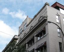 View of roof detailing of the main (west) elevation of the Hammond Building, Winnipeg, 2004; Historic Resources Branch, Manitoba Culture, Heritage, Tourism and Sport, 2004