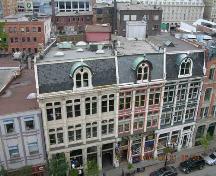 View taken from roof of 'Flat Iron' building, located to the north and east. #49 is on extreme left.; OHT, 2004