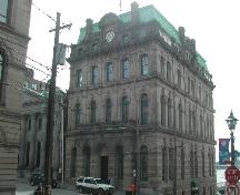 This photograph shows the contextual view of the building, 2005.; City of Saint John